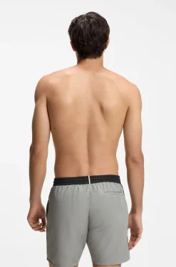 Medium-length swim shorts with contrast details