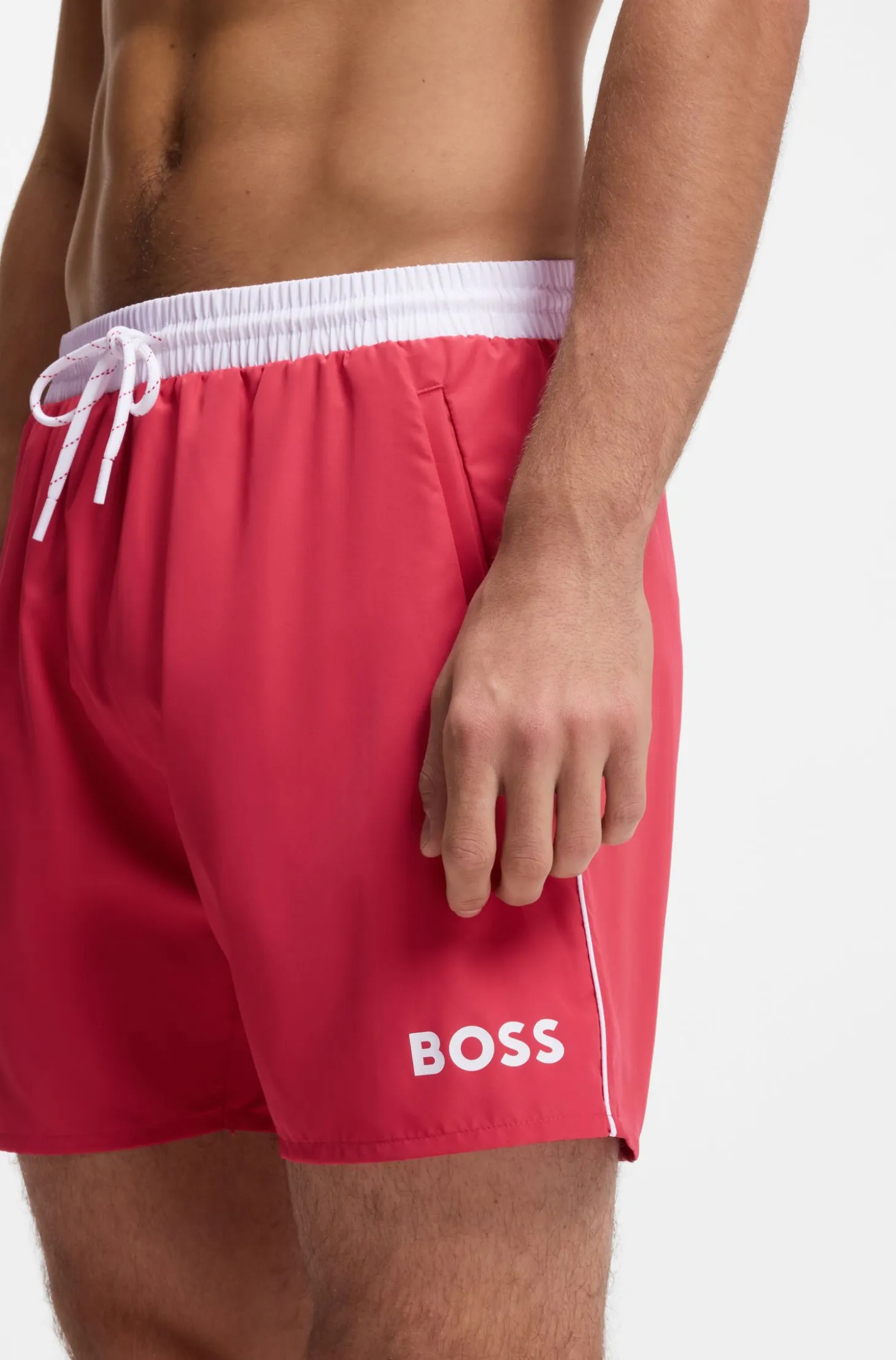 Medium-length swim shorts with contrast details