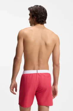Medium-length swim shorts with contrast details