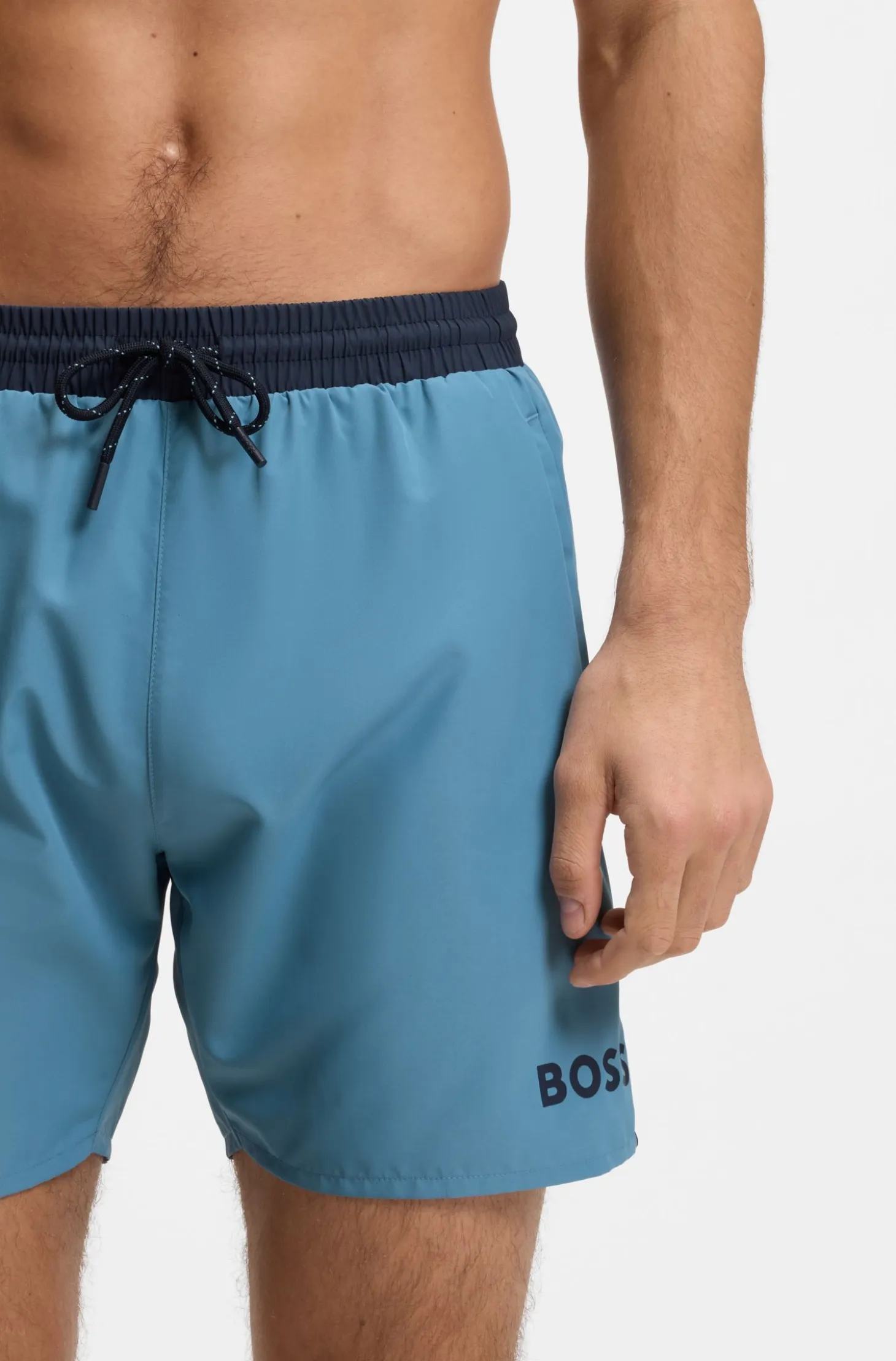 Medium-length swim shorts with contrast details