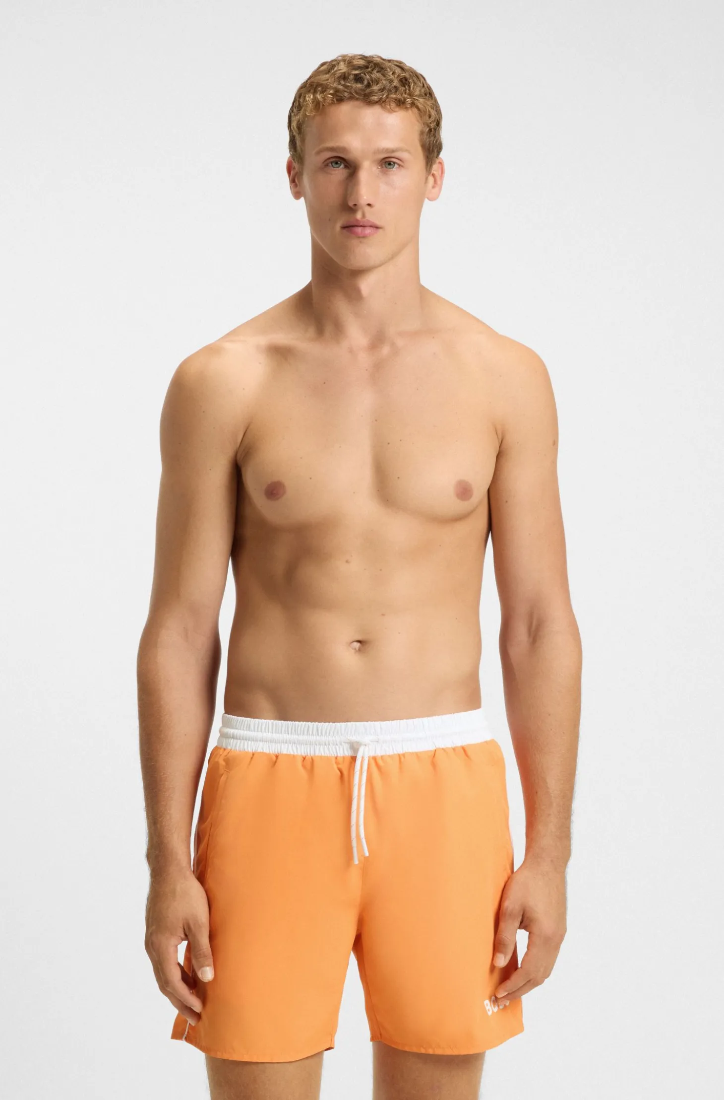 Medium-length swim shorts with contrast details