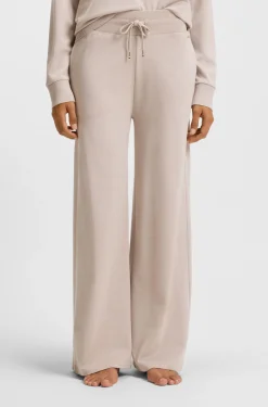 Melange-jersey tracksuit bottoms with logo plate
