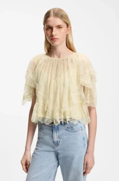 Mini cape blouse with lace trimmings