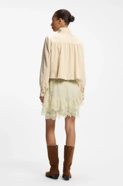 Mini skort in ruffled lace