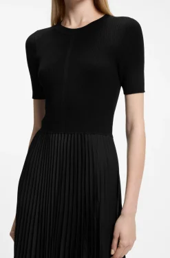 Mixed-material dress with plissé skirt