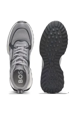 Mixed-material trainers with mesh details and branding