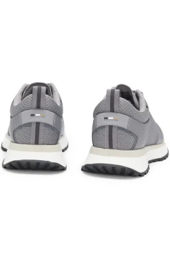 Mixed-material trainers with mesh details and branding