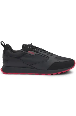 Mixed-material trainers with branded accents