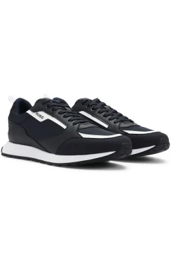 Mixed-material trainers with branded accents