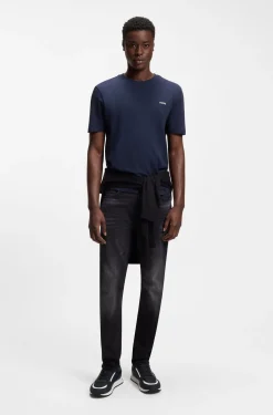 Mixed-material trainers with branded accents