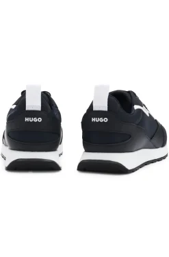 Mixed-material trainers with branded accents