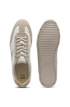 Mixed-material trainers with ridged outsole
