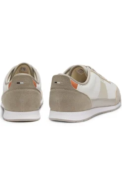 Mixed-material trainers with ridged outsole