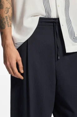 Modern-fit trousers in performance-stretch seersucker