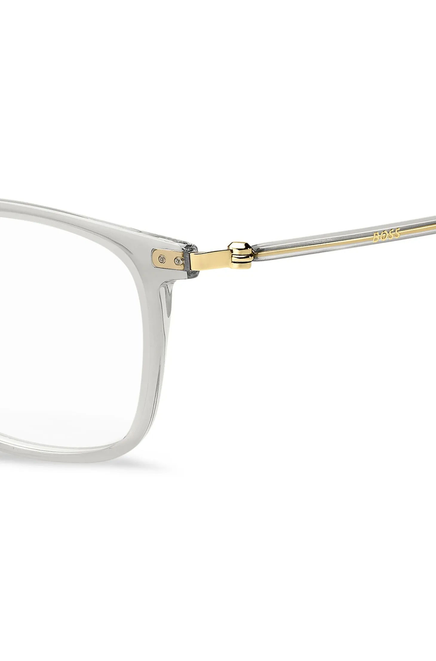 Optical frames in transparent acetate and gold-tone steel