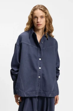 Oversized-fit blouse in smoky-blue rigid denim