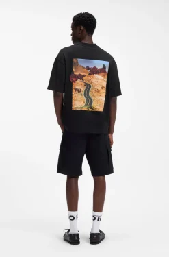 Oversized-fit cotton T-shirt with biker and roses graphic