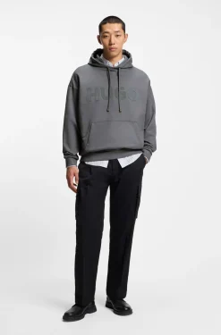 Oversized-fit hoodie in cotton terry with reflective logo