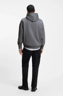 Oversized-fit hoodie in cotton terry with reflective logo