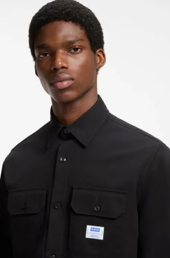 Oversized-fit shirt in cotton with flap chest pockets