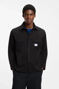 Oversized-fit shirt in cotton with flap chest pockets
