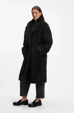 Oversized-fit teddy coat with double-breasted closure