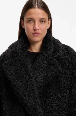 Oversized-fit teddy coat with double-breasted closure