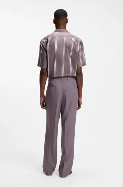 Oversized-fit trousers in draped twill