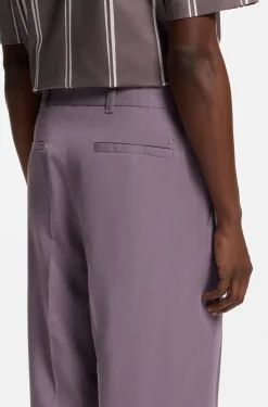 Oversized-fit trousers in draped twill