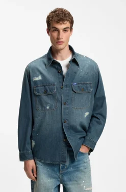 Oversize-fit denim overshirt with paint splashes