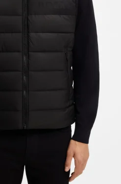 Padded gilet with a protective stand collar