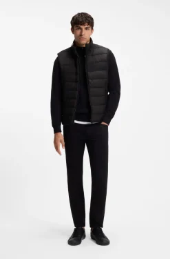 Padded gilet with a protective stand collar