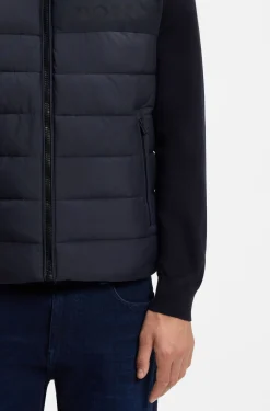 Padded gilet with a protective stand collar