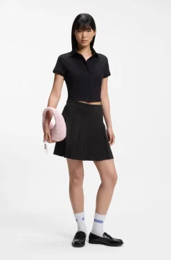 Pleated skirt in stretch cotton with integrated shorts