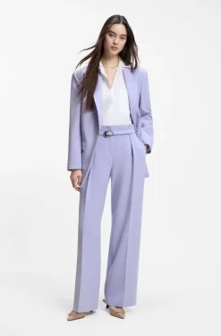 Pleat-front trousers with buckled belt