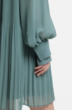 Plissé dress with sheer sleeves