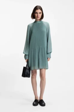 Plissé dress with sheer sleeves