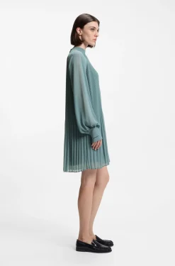 Plissé dress with sheer sleeves