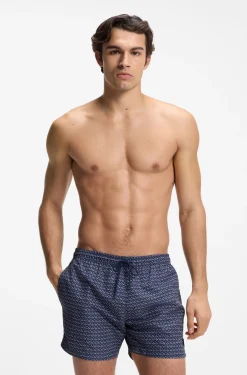 Printed swim shorts with logo badge