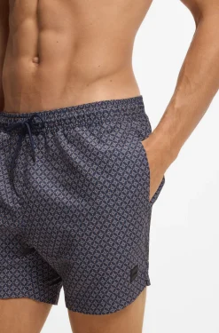 Printed swim shorts with logo badge