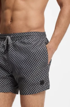 Printed swim shorts with logo badge