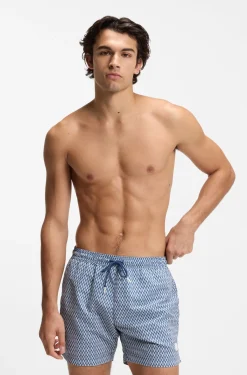 Printed swim shorts with logo badge