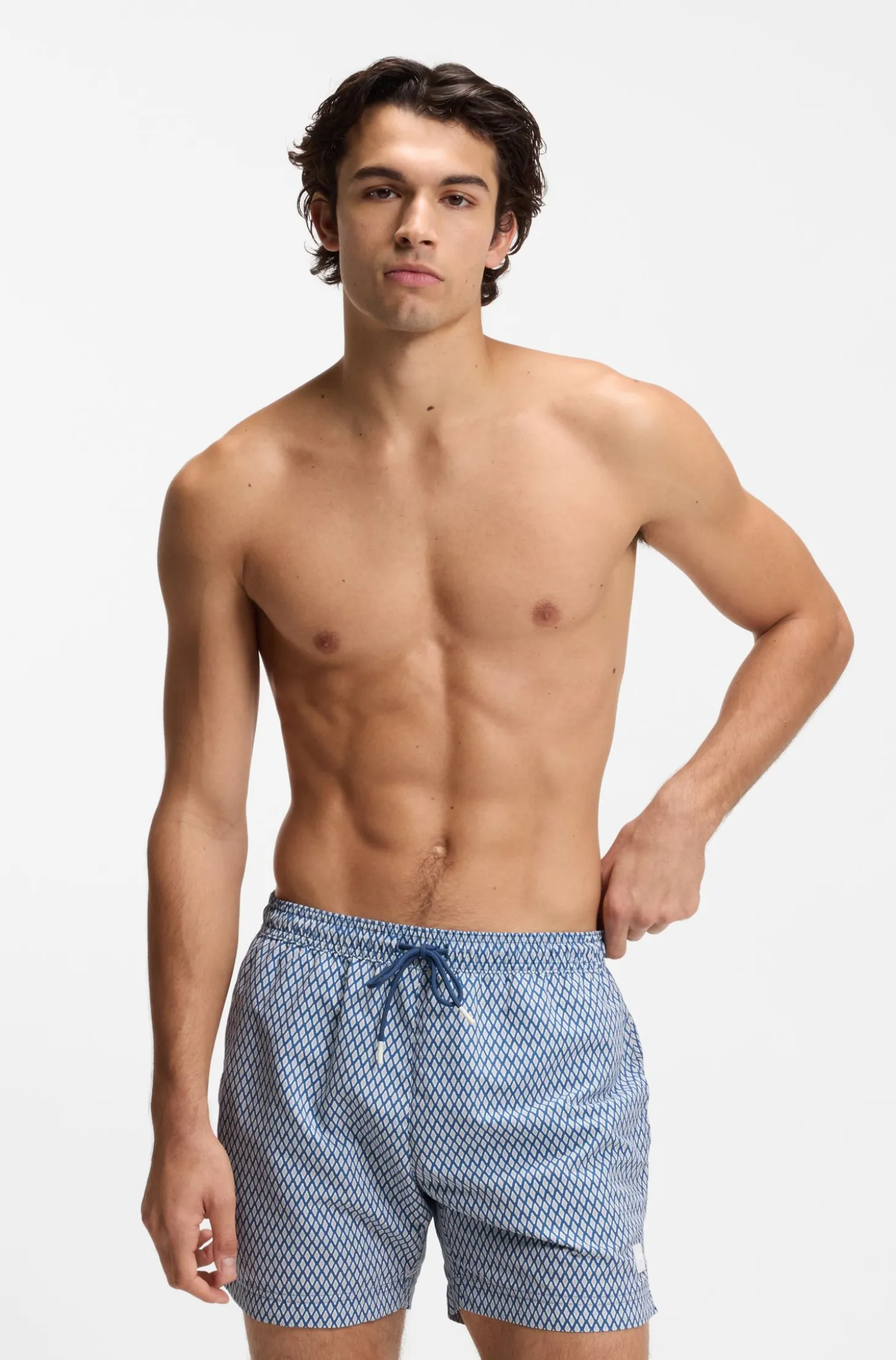 Printed swim shorts with logo badge
