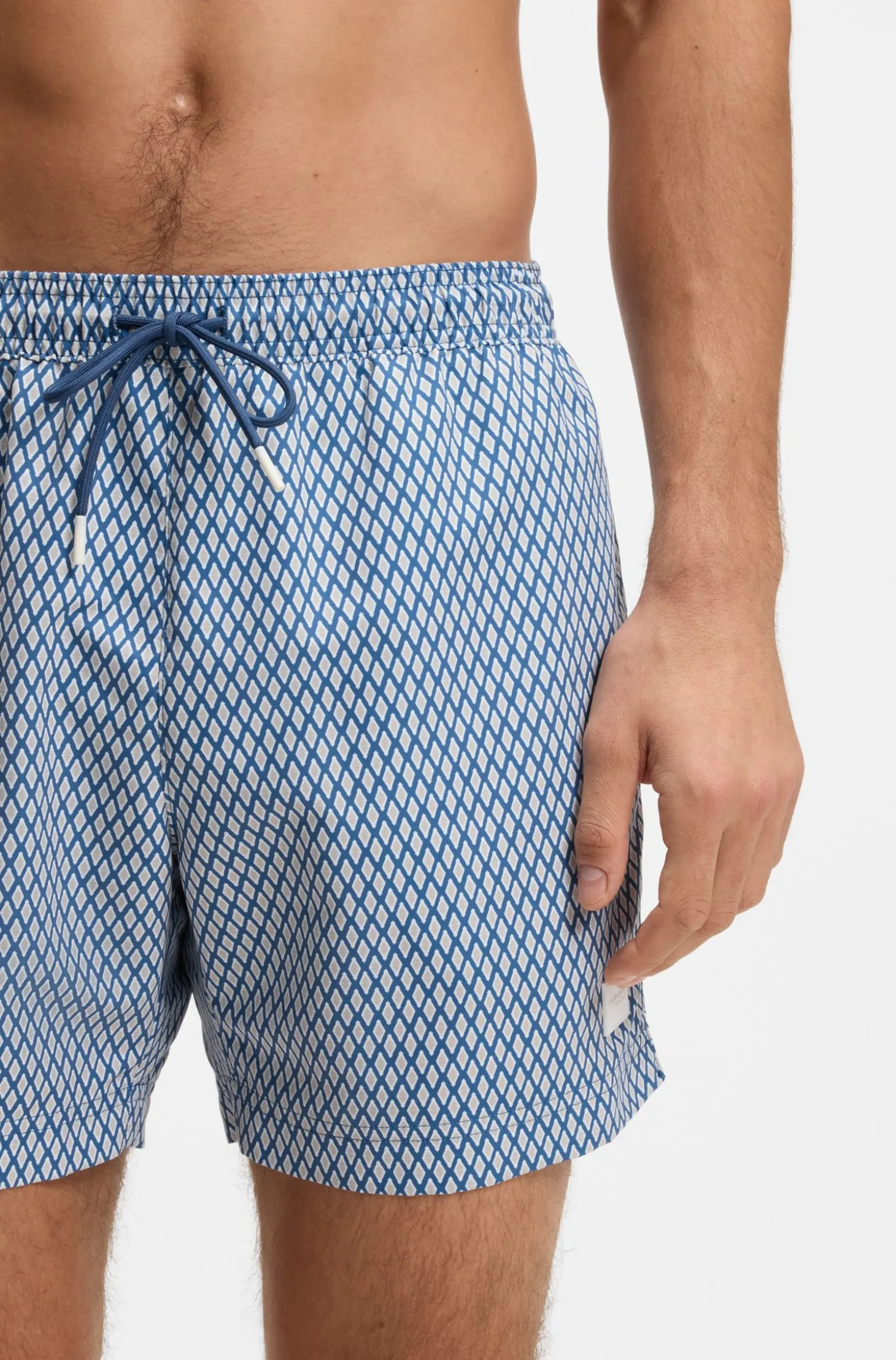 Printed swim shorts with logo badge