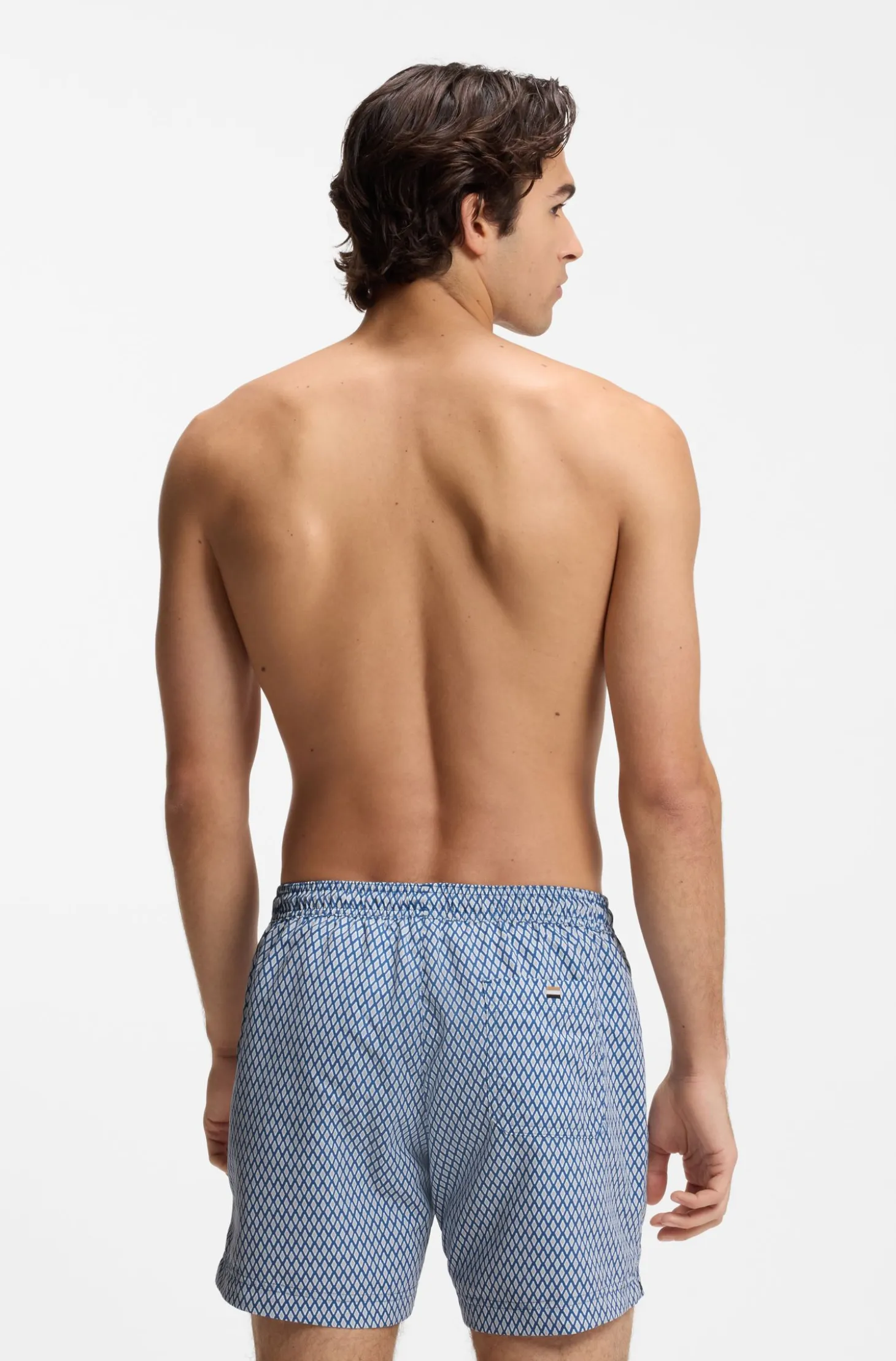 Printed swim shorts with logo badge
