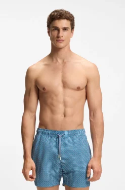 Printed swim shorts with logo badge