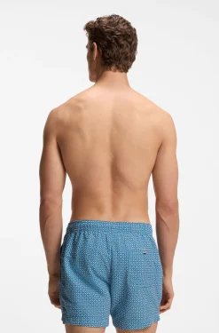 Printed swim shorts with logo badge