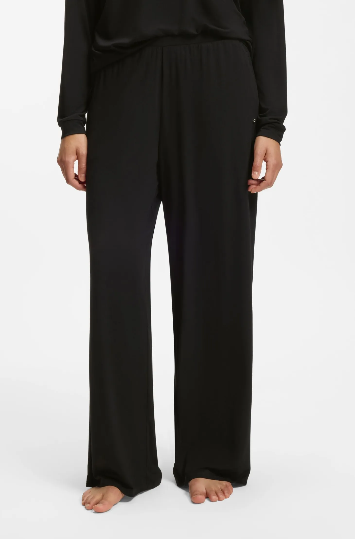 Pyjama bottoms with lace-trimmed pockets