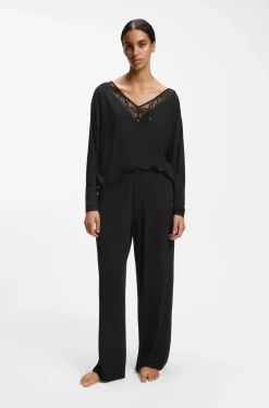 Pyjama bottoms with lace-trimmed pockets