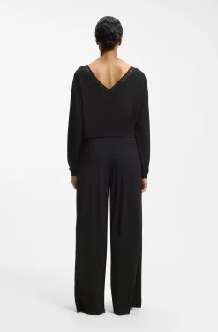 Pyjama bottoms with lace-trimmed pockets